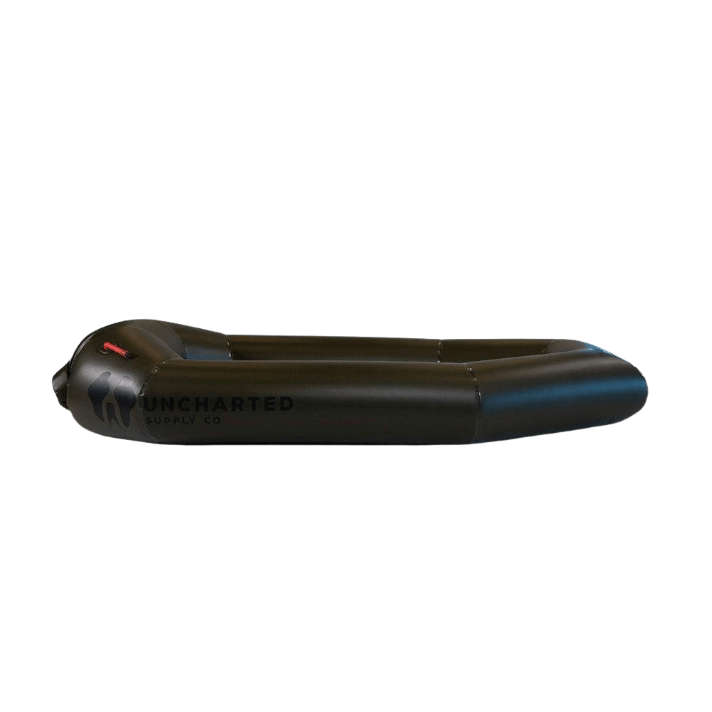 Lightweight and packable Rapid Raft by Uncharted Supply Co. inflated on water for adventure and emergencies