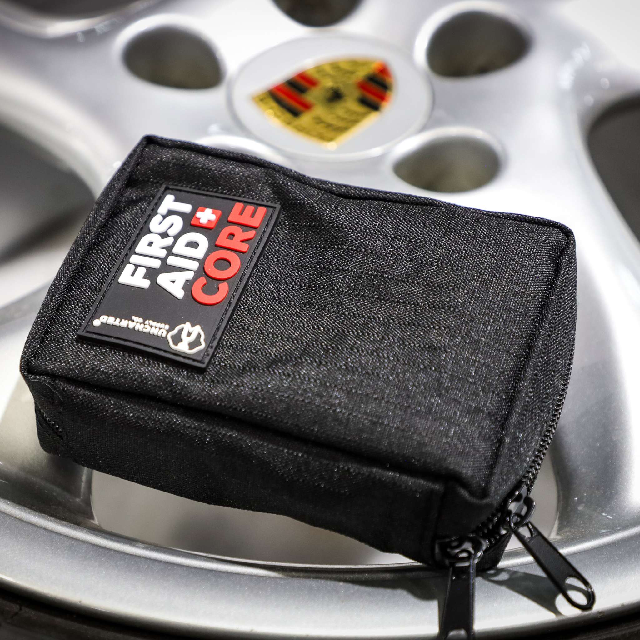 Compact First Aid Core kit with essential medical supplies in water-resistant case for emergencies