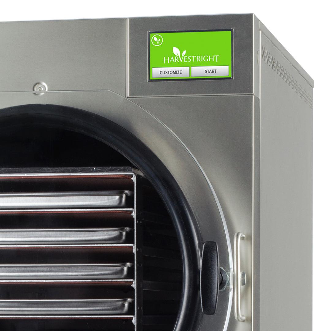 Large home freeze dryer with stainless steel trays and vacuum pump for high-capacity food preservation