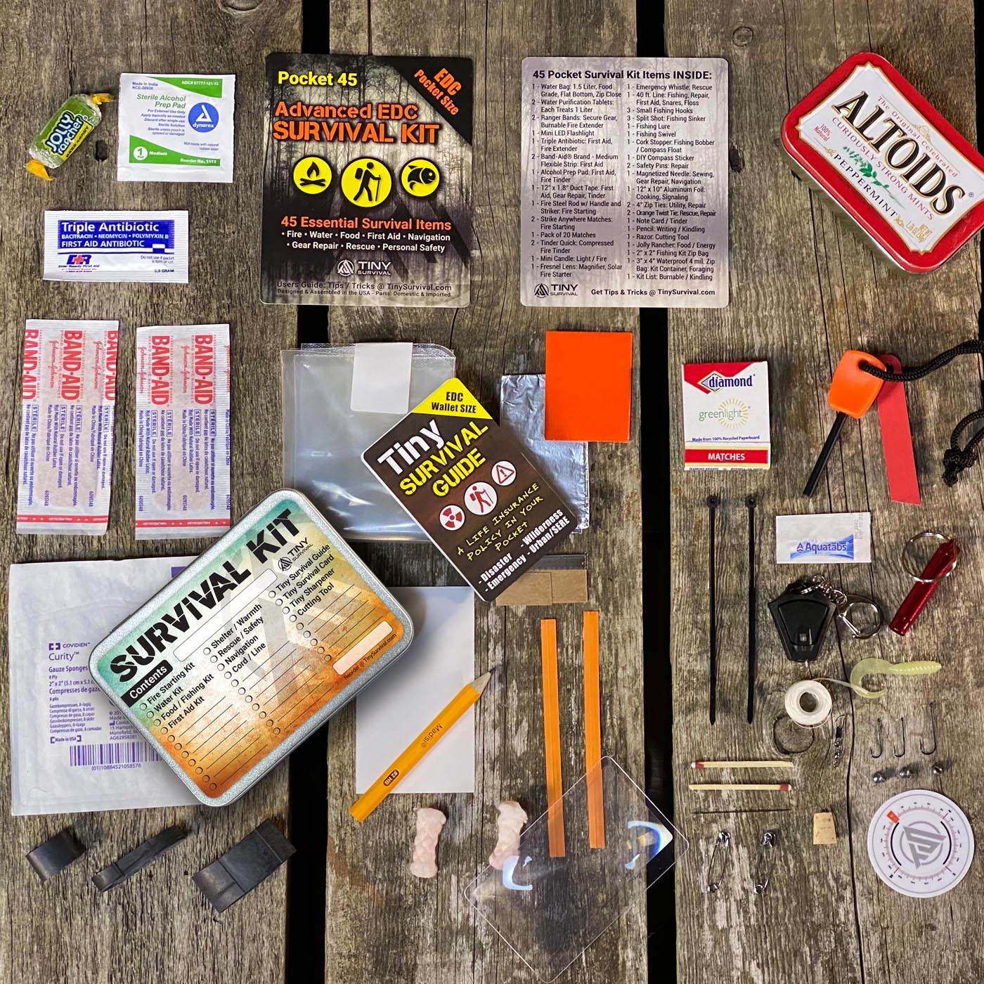 P-49 Elite 49-in-1 survival kit bundle with tin, guide, and essential outdoor emergency gear