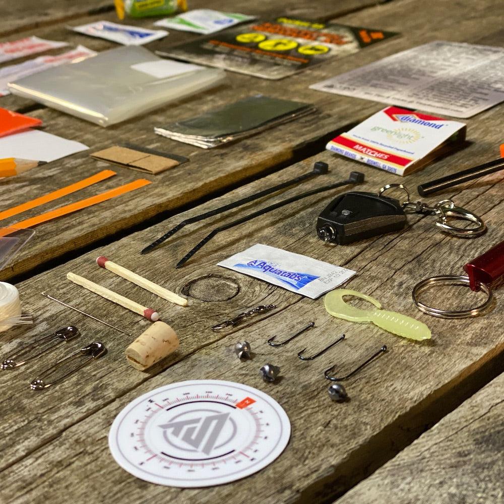 Compact Pocket 45 Survival Kit with 45 essential emergency tools in a clear waterproof zip bag