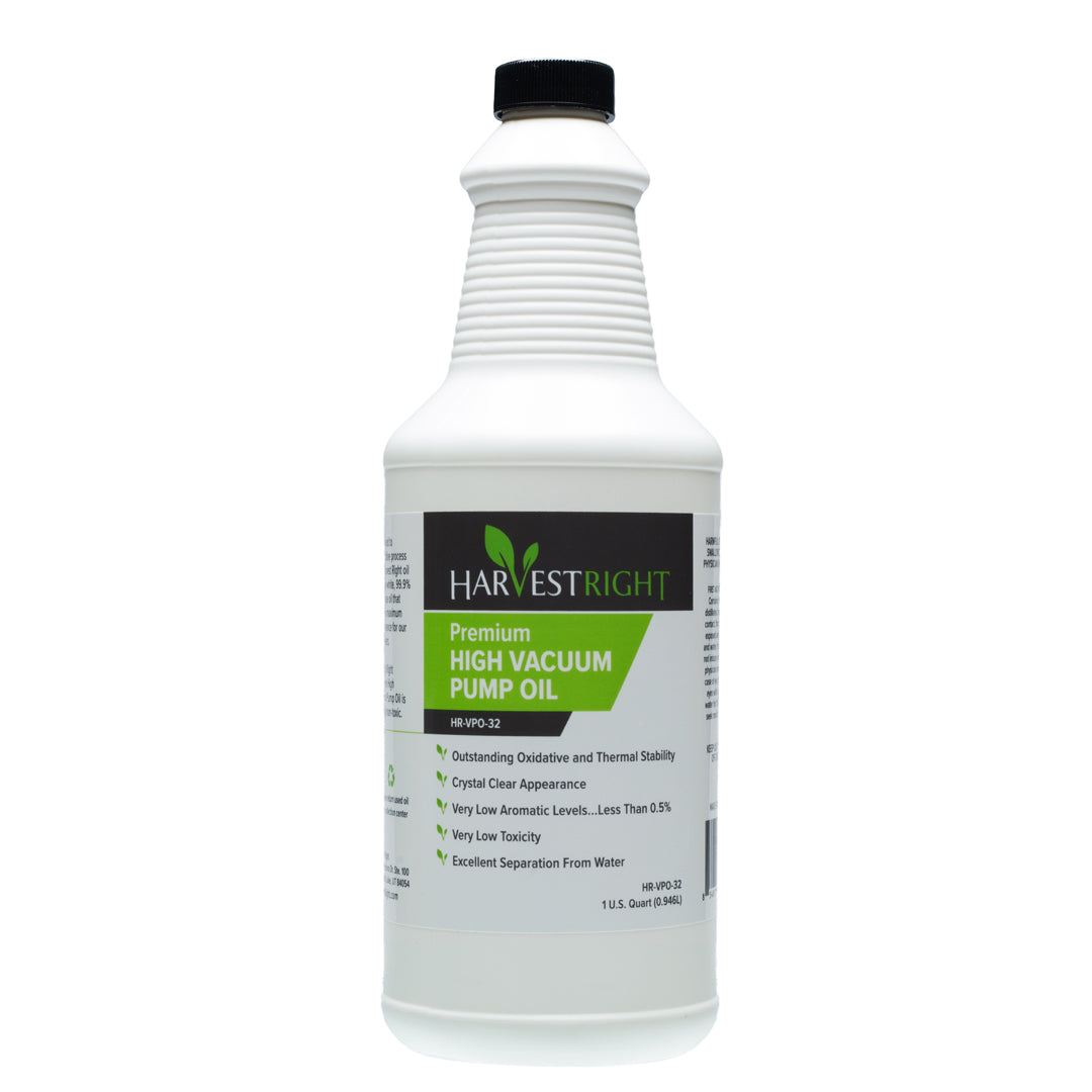 Clear premium high vacuum pump oil bottle with 1 quart capacity and safety warning labels