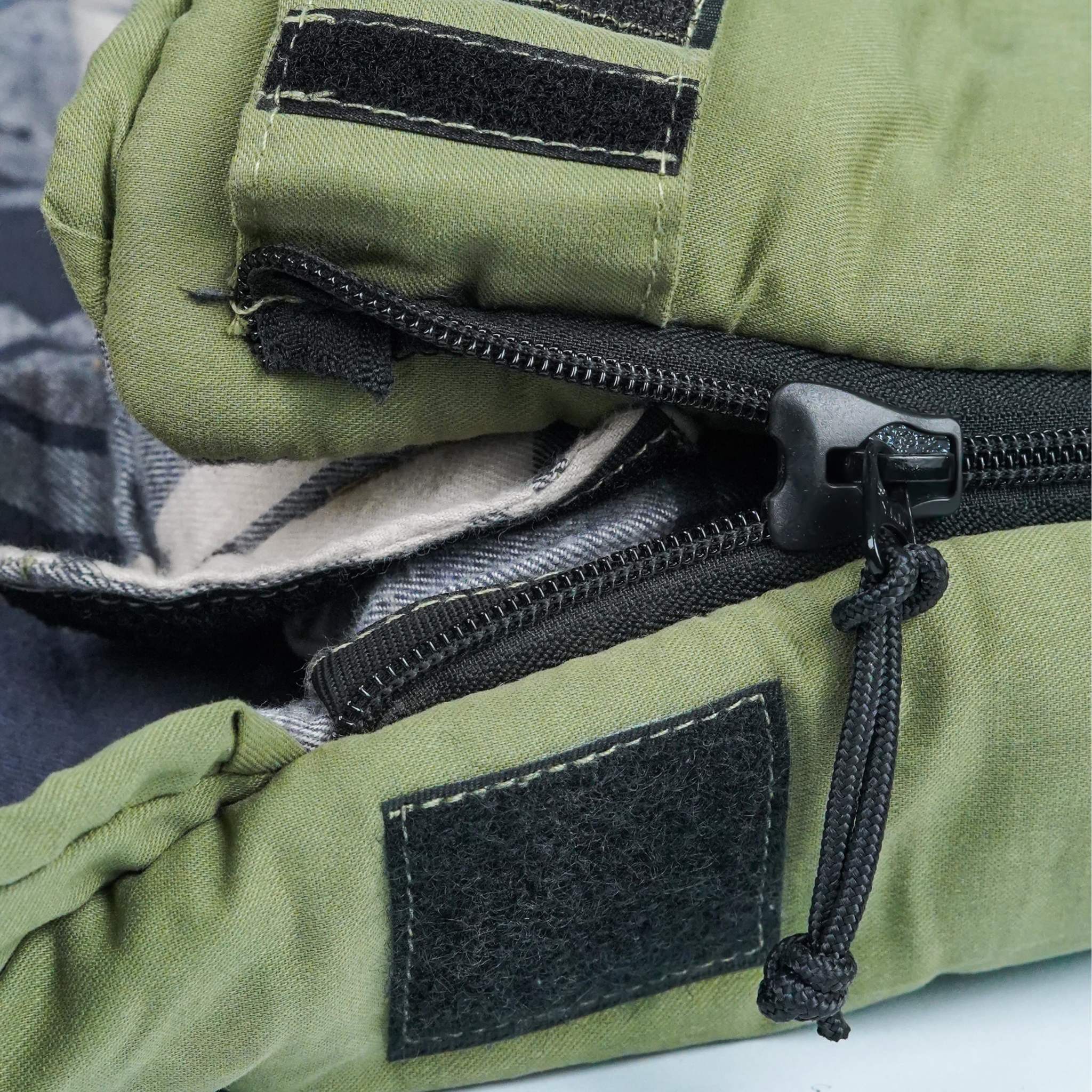 Slumbernest™ Sleeping bag with durable outer shell and soft flannel lining for outdoor camping