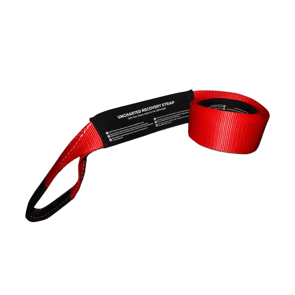 Heavy-duty red tow strap with reinforced loops for off-road vehicle recovery and roadside assistance
