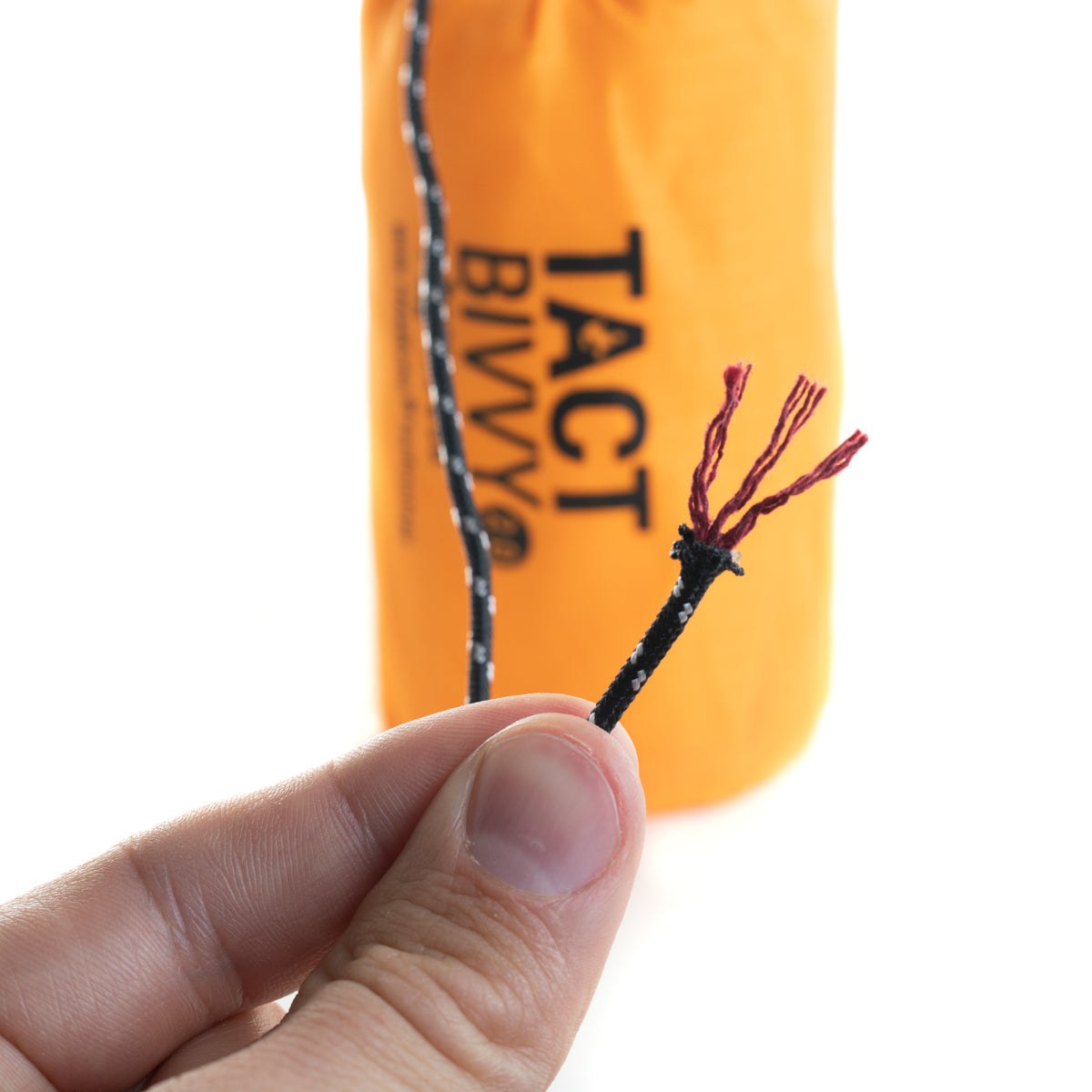 Tact Bivvy® 2.0 ultralight emergency sleeping bag folded compactly, waterproof and insulated for outdoor survival